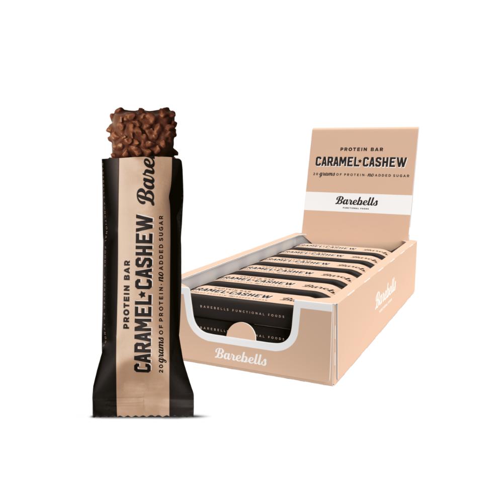 Barebells Caramel Cashew protein bar, unwrapped to show gooey caramel and cashew chunks, next to a 12-pack box.