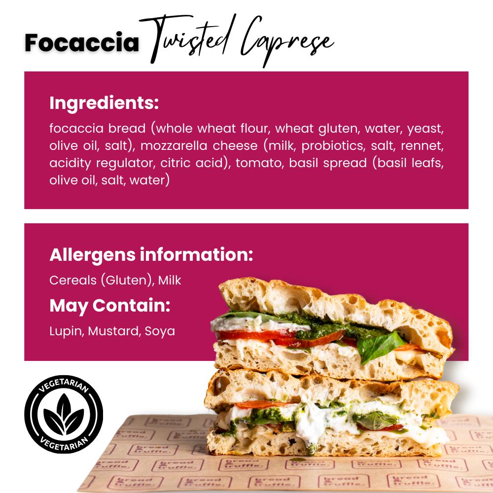 Twisted Caprese Focaccia Sandwich with fresh mozzarella, vine tomatoes, and basil sauce on rustic bread.