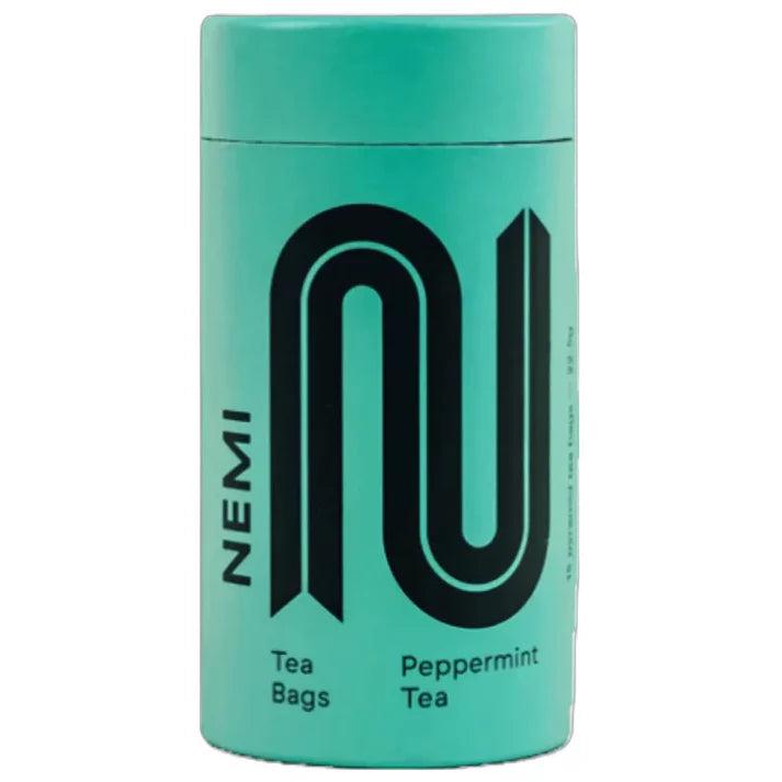 NEMI Peppermint Tea tube, a tall, cylindrical, mint green package with a large black "N" logo.