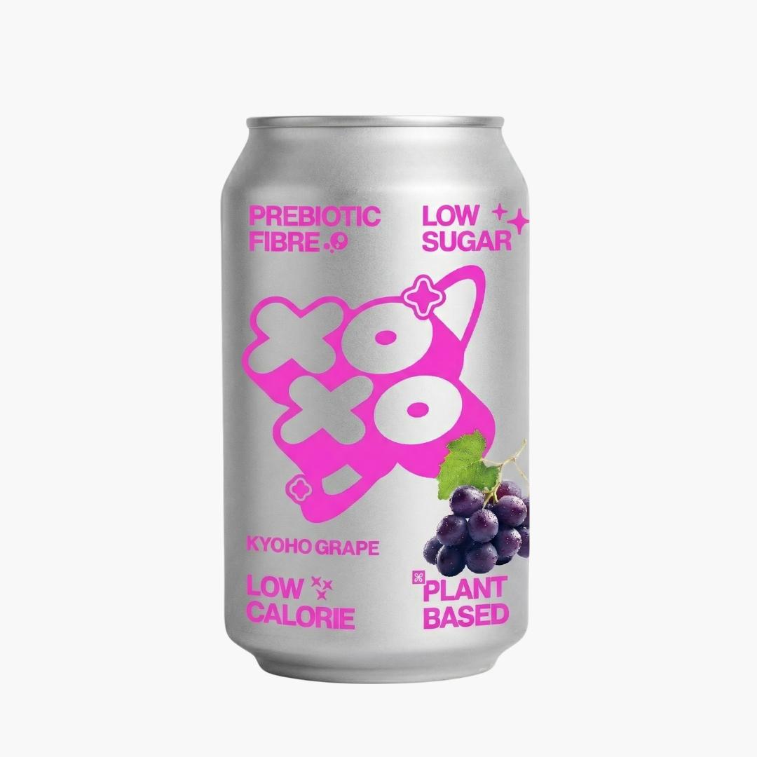 Silver XOXO Kyoho Grape 330ml can with pink text, showing "Prebiotic Fibre," "Low Sugar," and a bunch of grapes.