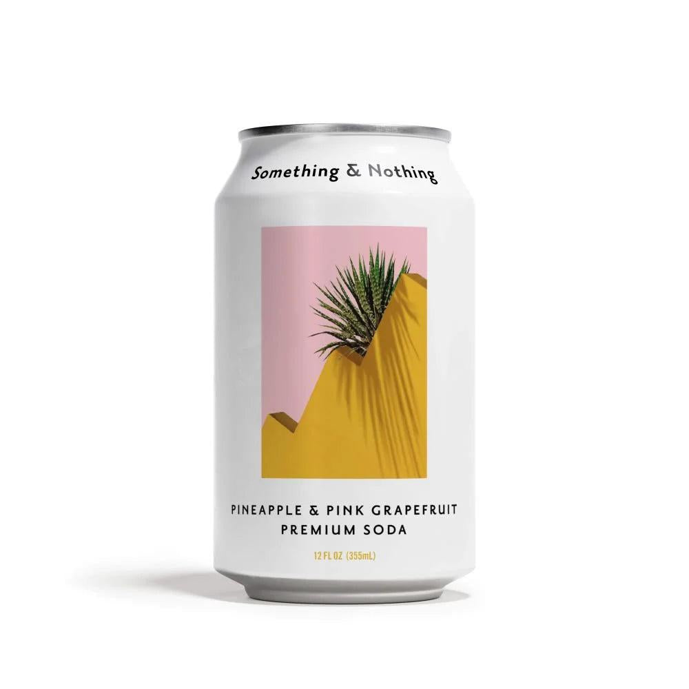 White Something & Nothing Pineapple & Pink Grapefruit soda can with a pink and yellow abstract design.