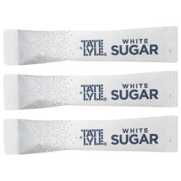 Three white Tate & Lyle sugar sticks with "WHITE SUGAR" text and a speckled design.