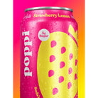 Wet Poppi Strawberry Lemon prebiotic soda can, vibrant pink with yellow lemon graphic and "5g Sugar" label.