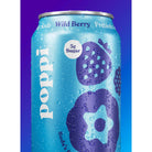Poppi Wild Berry prebiotic soda can, light blue with purple berry graphics and water droplets, showing "5g Sugar".