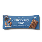 Deliciously Ella Cacao & Almond Oat Bar in blue wrapper with visible almonds and cacao nibs.