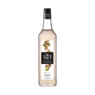 1883 Maison Routin Pistachio Syrup 1L bottle with a black cap and label featuring pistachios.