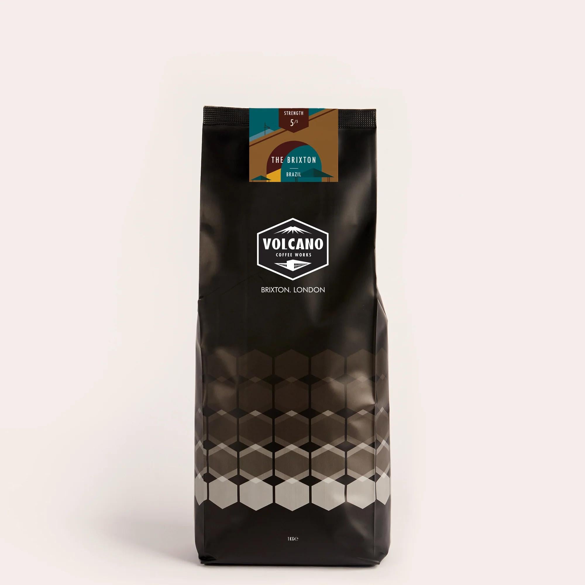 Volcano Coffee Works "The Brixton" dark roast coffee bag with geometric pattern.