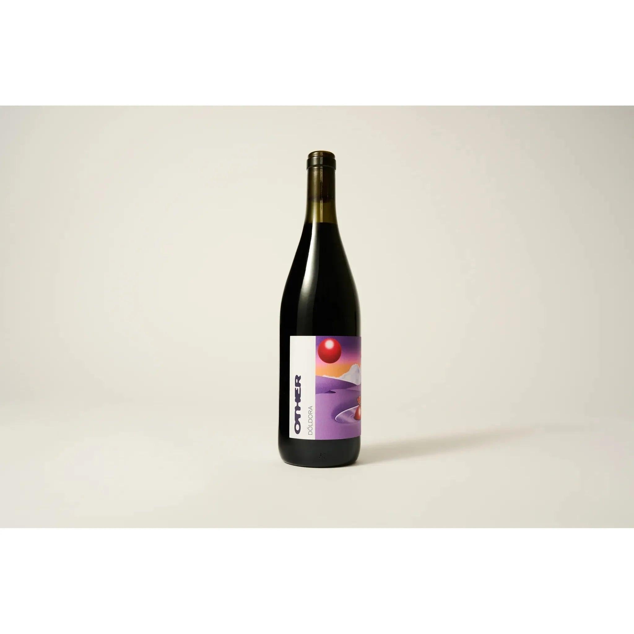 Dark red wine bottle with a purple and orange abstract label featuring "OTHER DÓLDORA".