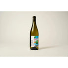 Other World Wine Jumi-Juma bottle with a colorful, abstract label featuring green spheres and a checkered pattern.