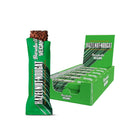Green Barebells Vegan Hazelnut Nougat protein bar with a bite taken, next to a full display box.