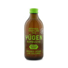 Yugen Kombucha Apple Mint Bio in a brown glass bottle with a green cap and label.