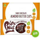Pip & Nut Dark Chocolate Almond Butter Cups, 15-pack, with a single cup wrapper showing a bitten cup.