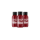 Three small, dark red "Fighter Shots" ginger and beetroot bottles with black caps.