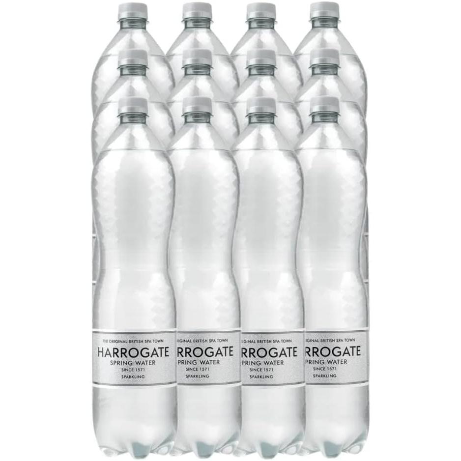 Twelve clear 1.5L PET bottles of Harrogate Sparkling Spring Water with white caps and labels.