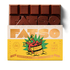 Fatso Drunk'n Monkey dark chocolate bar with spiced rum, banana chip, and salted cracker, in yellow packaging.