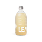 Clear glass bottle of LemonAid Gingerade with a silver cap and white label, 330ml.