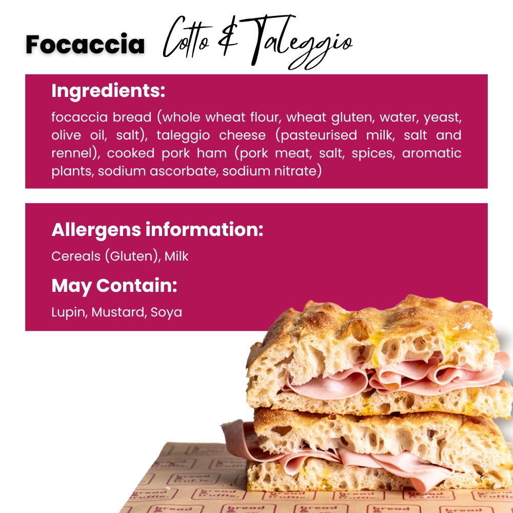 Golden focaccia bread sandwich with pink cotto ham and creamy Taleggio cheese, stacked on branded paper.