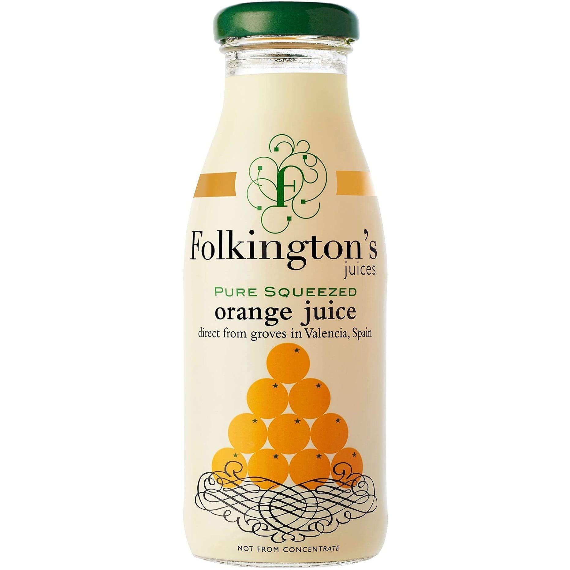 Folkington's Pure Squeezed Orange Juice in a clear glass bottle with a green cap and orange label.