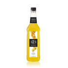 1883 Maison Routin Mango Syrup 1L bottle with yellow liquid and mango cubes on the label.