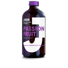 Jarr Passion Fruit Kombucha in a dark glass bottle with a purple cap and white label.