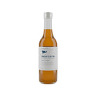 Marna Lemon Iced Tea in a 330ml clear glass bottle with a white label and blue whale logo.