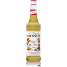 Monin Maple Spice 70cl glass syrup bottle with a white label, red accents, and autumn leaf design.