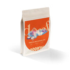 White Oddkin EA Decaf 1Kg coffee bag with orange label featuring a sleeping cartoon character.