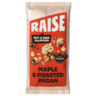 Raise Snacks Maple & Roasted Pecan nut and seed clusters in a cream and red pouch with "great taste" star.