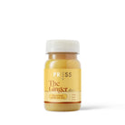 PRESS Ginger Shot in a small clear bottle with a white cap and yellow label.