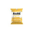 Yellow Rare Popcorn Sweet & Salt bag with white branding and scattered popcorn kernels.