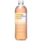 Vitamin Well Zero Peach drink in a clear plastic bottle with a white cap and peach-colored liquid.