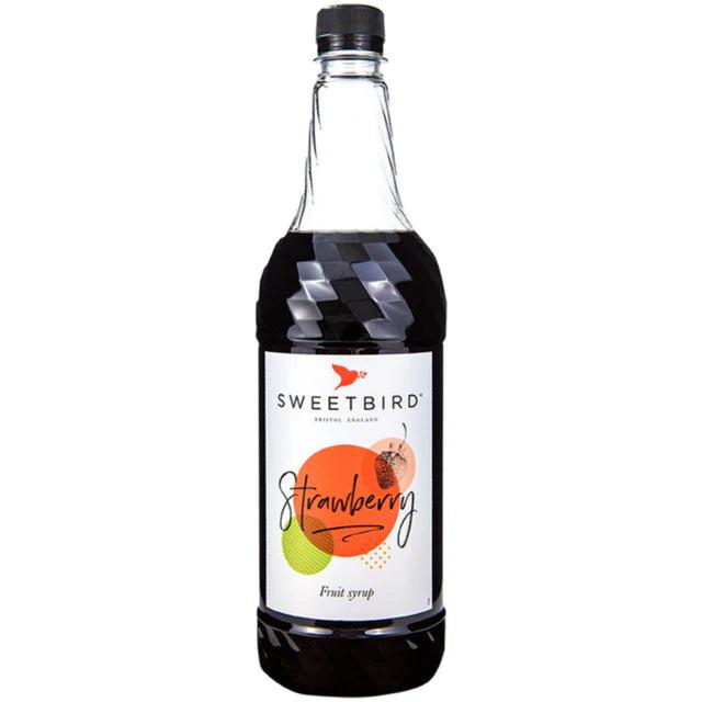 Sweetbird 1L Strawberry Fruit Syrup in a clear glass bottle with a black cap and white label.