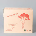 Light peach cardboard box of Trampoline Chamomile tea with a red illustration of a dancing person and "Helping Refugees Rise & Shine.