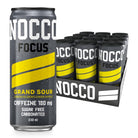 NOCCO Focus Grand Sour 330ml can, dark grey with yellow stripes, next to a 12-pack tray.