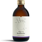 Dark amber glass bottle of YOU + I Lemon Lavender Kombucha with a gold cap and a white label featuring a lemon and lavender illustration.