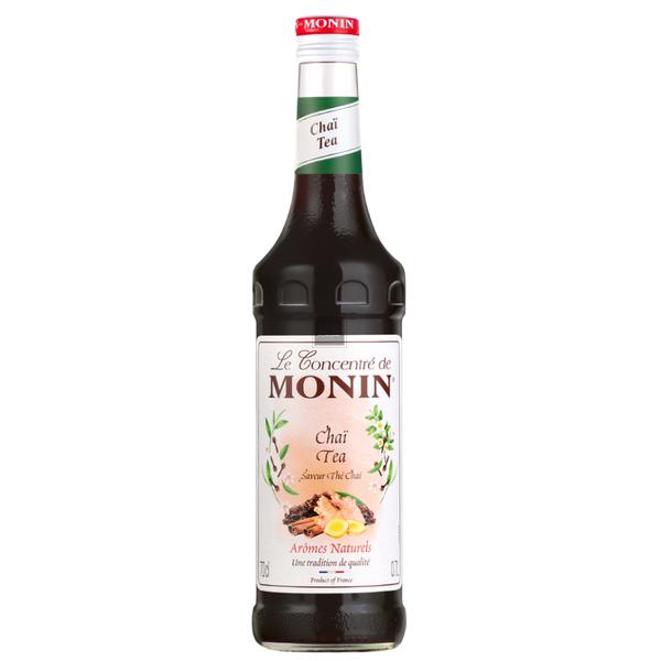 Monin Chai Syrup 1L bottle with dark liquid, red cap, and spiced tea label.
