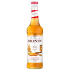 Monin Honey Syrup 70cl glass bottle with a red and white label, showing honeycombs and a honey dipper.