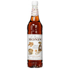 Monin Salted Caramel Syrup 1L bottle with amber liquid, white cap, and decorative label featuring caramel candy.