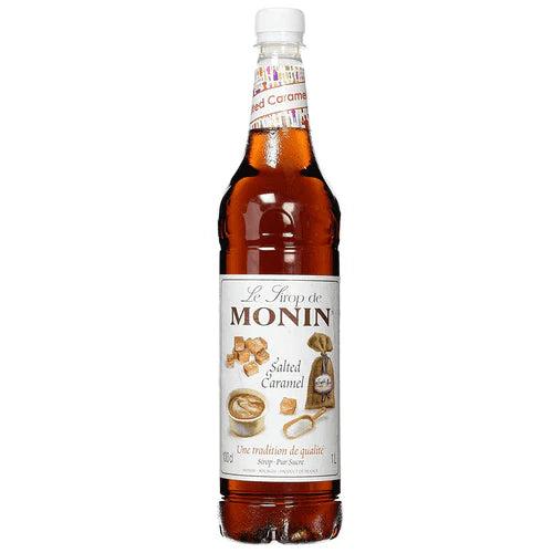 Monin Salted Caramel Syrup 1L bottle with amber liquid, white cap, and decorative label featuring caramel candy.