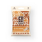 White recyclable pouch of Coco Cubes Salted Caramel, featuring palm trees and a coconut snack.