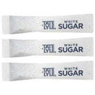 Three white Tate & Lyle sugar sticks with "WHITE SUGAR" text and a speckled design.